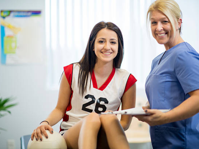 An athlete receiving rehibilitative care for a sports injury.
